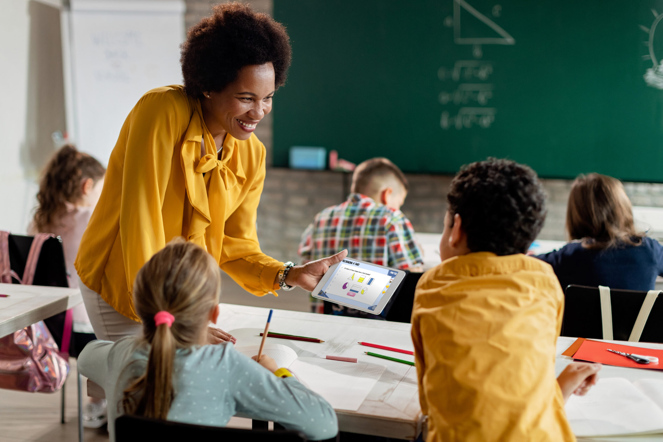Everybody Counts in the class with a lesson on a tablet.